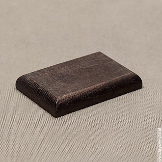 : Podstawka drewniana 10x6 cm kolor heban, frez zaokrąglony Podstawka drewniana 10x6 cm kolor heban, frez zaokrąglony